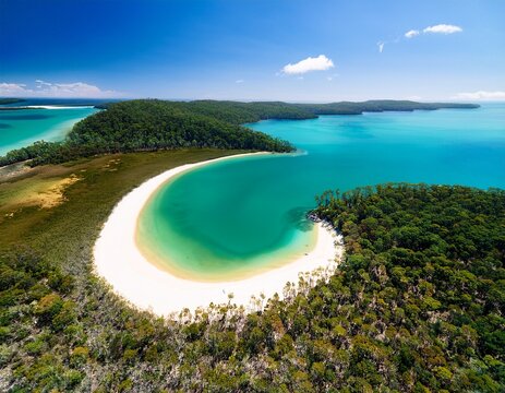 bird s eye view of turquoise lake mckenzie surrounded by dense green forests and pristine white sand on the picturesque fraser island queensland australia
