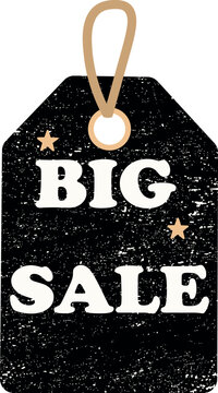 A black grunge-style sale tag features bold white &ldquo;BIG SALE&rdquo; lettering, small gold stars, and a gold hanging loop