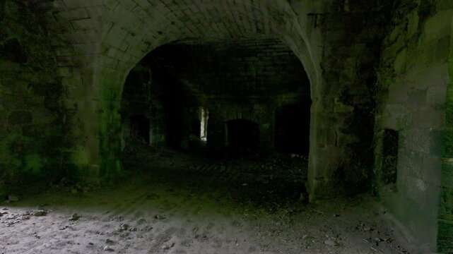 Dark rooms beneath Twizel castle on the Scottish borders