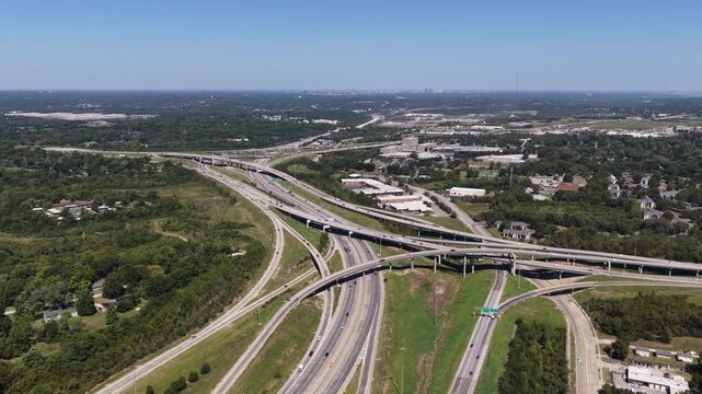 Aerial of complex highway interchange in Kansas City Missouri interstate 49 with suburban development