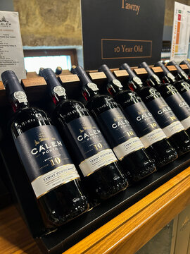 Bottles of portuguese port on a store shelf. Close-up. Porto. Portugal.