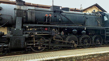 Nitra, Slovakia - September 5, 2026: Large Historic Steam Locomotive on Station Track © Serge