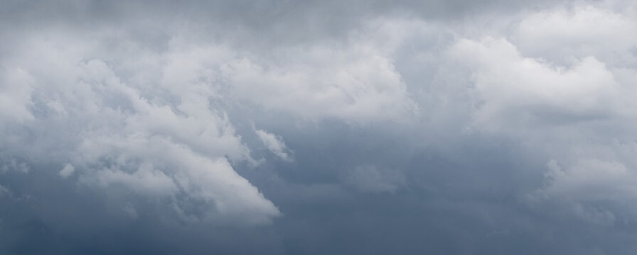 Panoramic sky with dense gray clouds before thunderstorm