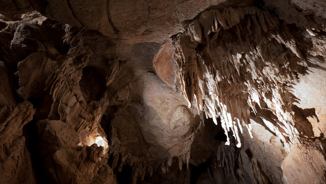 Mysterious Natural Cave Interior with Dramatic Rock Formations