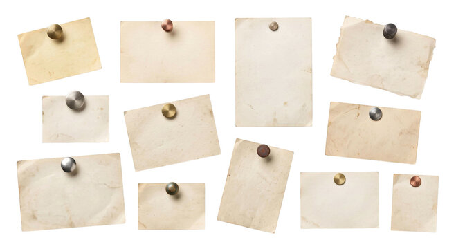 Collection of aged paper notes pinned to a white background with various fasteners