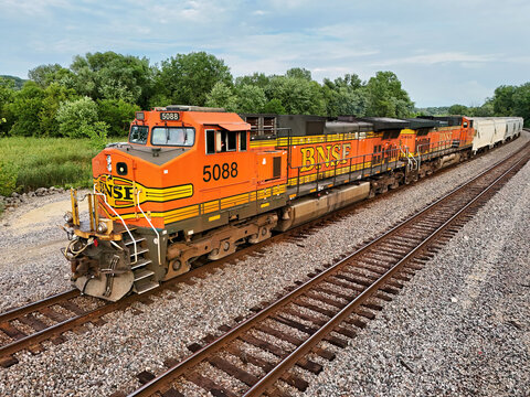 Savanna, Illinois August 16, 2026 BNSF 5088 GE C44‑9W locomotive leading a freight train along Midwestern mainline tracks