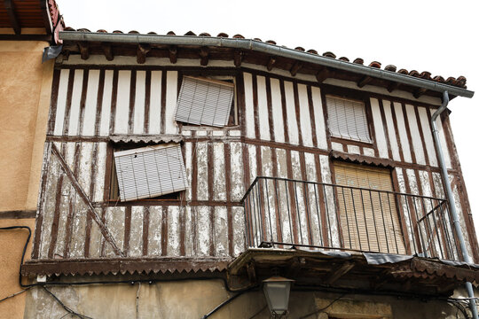 Typical houses with granite stone plinths and upper floors with geometric wooden frameworks and adobe in La Alberca town