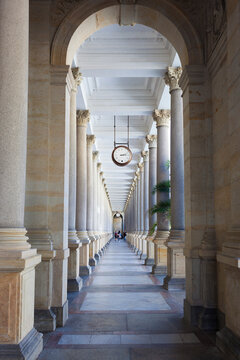 Karlovy Vary arcade featuring columns and clock in Czech Republic during the day