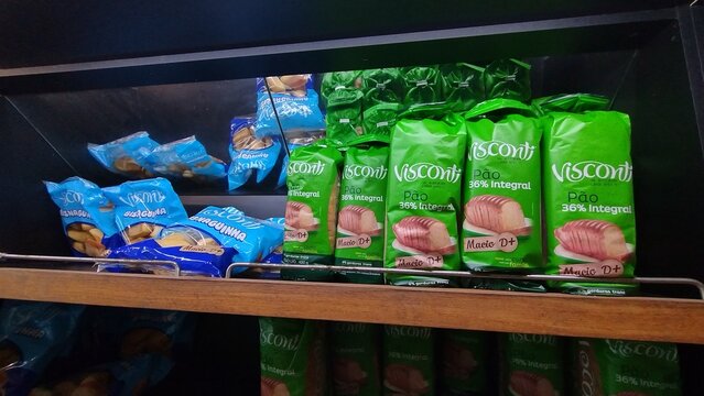 ITABIRA, BRAZIL - SEPTEMBER 03, 2026: Packages of Visconti 36% whole grain sliced bread displayed on a grocery store shelf promoting healthy diet choices.