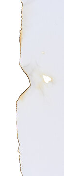 Torn and faded edge of a white sheet of paper on an isolated background