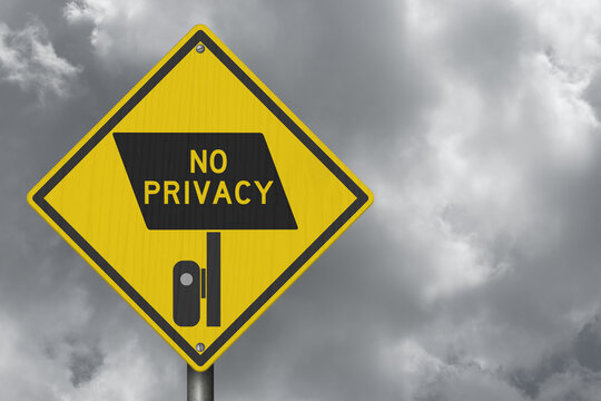 Surveillance camera icon with No Privacy text yellow warning sign with stormy sky for license plate reader LPR