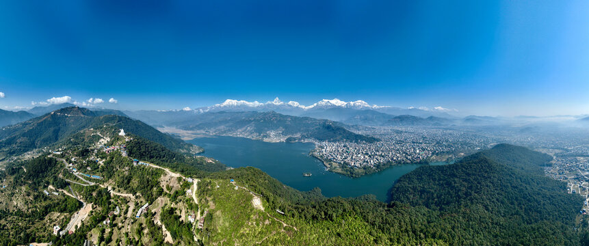 Pokhara and Phewa Lake beneath the Himalayan range