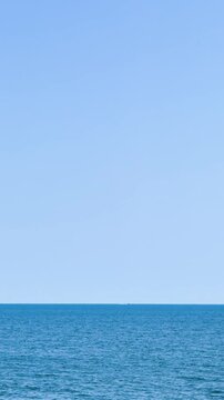 Turquoise ripple water reflection in tropical beach. Blue ocean waves. Summer sea. Waves in motion