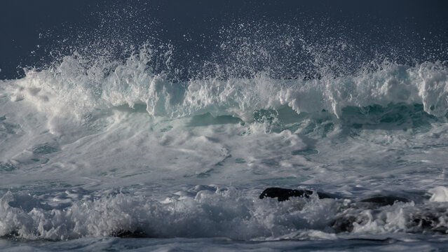 Powerful Ocean Wave Breaking with White Foam and Sea Spray