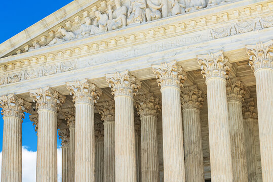Classical marble columns of United States Supreme Court building in Washington DC legal district