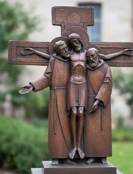 Bronze crucifix with two Franciscan friars