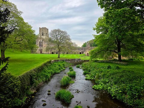 Fountains Abbey is a ruined Cistercian monastery near Ripon in North Yorkshire, England. Together with the surrounding Studley Royal Park it is a world heritage site