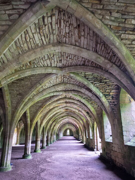 Fountains Abbey is a ruined Cistercian monastery near Ripon in North Yorkshire, England. Together with the surrounding Studley Royal Park it is a world heritage site