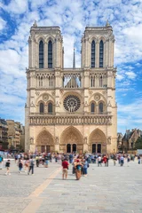 Notre-Dame de Paris Cathedral with crowds on Place Jean-Paul II, Paris, France © mojolo