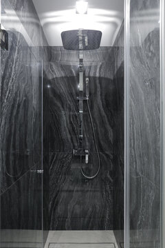 Grey shower apartment bathroom interior