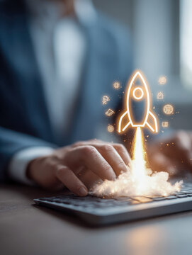 Businessman typing on keyboard with digital rocket launching symbolizing innovative startup growth and technological advancement in a modern office environment