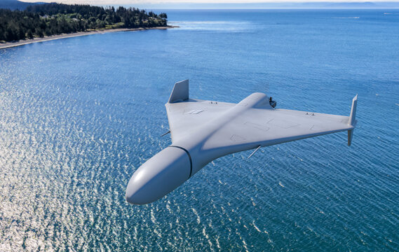 Unmanned Stealth Drone Flying Over Blue Ocean Coastline With Aerial Surveillance View