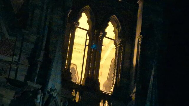 Cordoba, Argentina - April 12, 2026: Small drone flies in front of the illuminated neo-Gothic facade of Iglesia del Sagrado Corazon de Jesus, known as Los Capuchinos Church, in Nueva Cordoba at night.