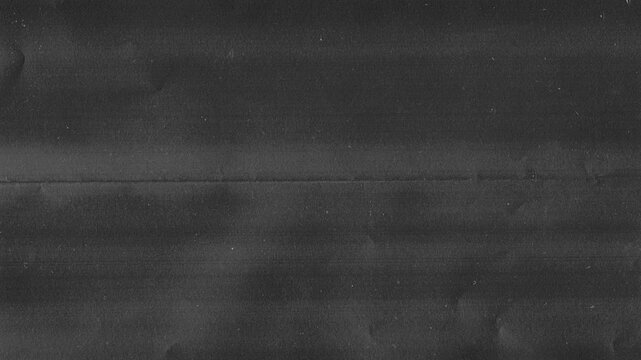 Stop Motion of textured dark gray paper with horizontal lines, noisy abstract background