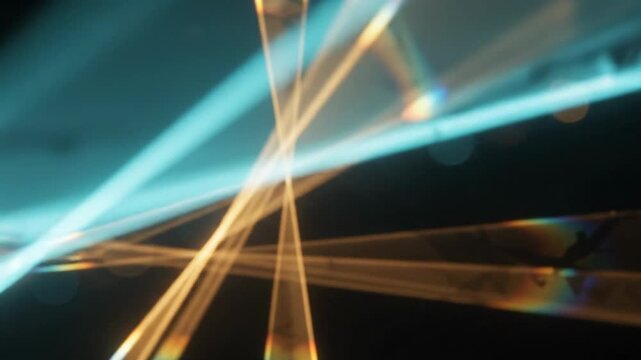 Abstract light leak refraction and cinematic rays on black background