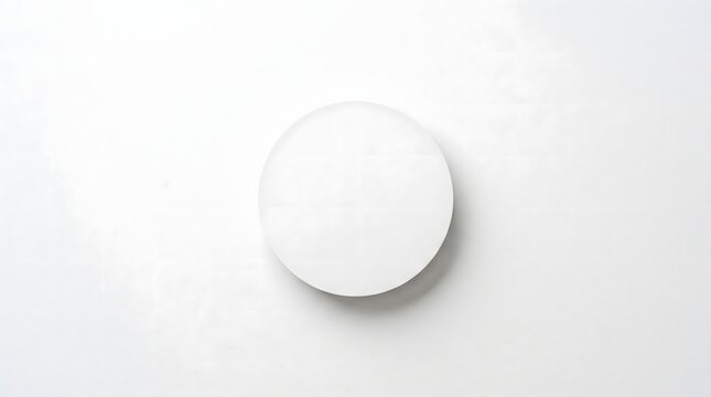 Minimalist white circle with soft drop shadow on neutral background