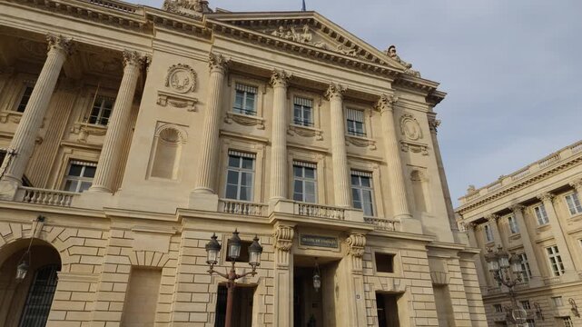 Hotel de Coislin neoclassical facade with columns and ornate details in Paris, France