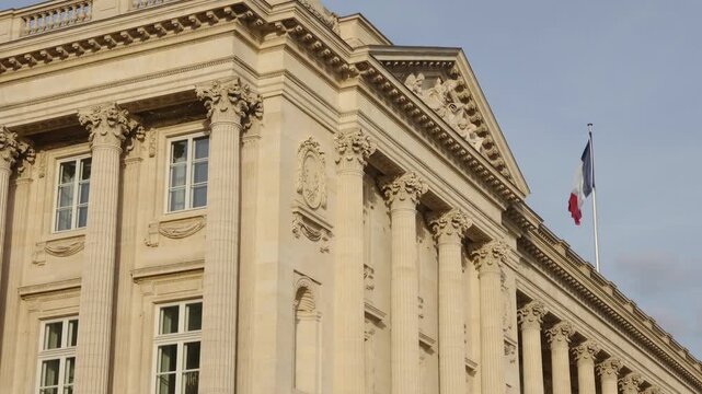 Hotel de la Marine historic building featuring classical architecture and the French national flag