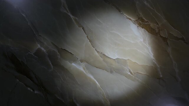 Onyx backlit panel with light sweeping slowly across the surface