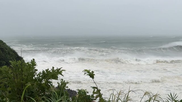 Large Storm Waves Crash Into Coastline As Hurricane Approaches Land