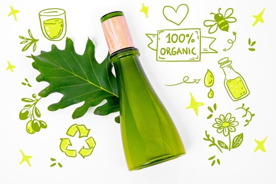 A green glass bottle with a wooden cap rests beside an oak leaf on a white background, surrounded by hand drawn organic and eco themed doodles.