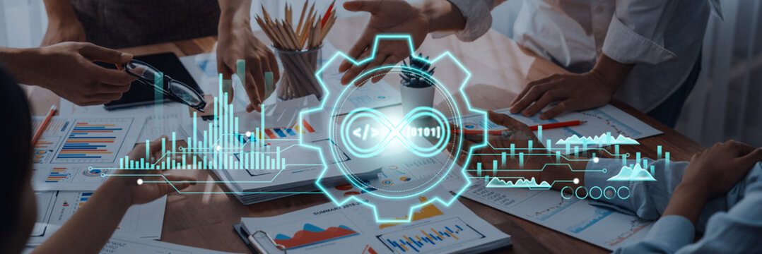 A modern business meeting showcasing teamwork and digital analytics. Professionals engage with data visualization tools to enhance strategic planning and decision-making. Trope