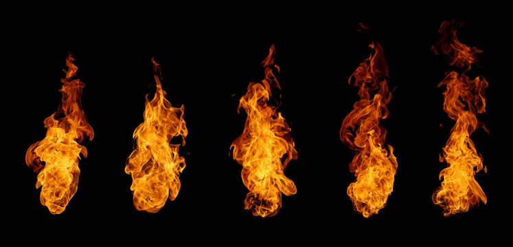 Collection of multiple fire flame plumes and burning fire tongues isolated on black background. Dynamic bonfire spark overlay for cinematic special effects and energy design assets.