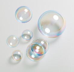 Obraz premium Colorful soap bubbles floating on white background