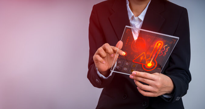 Business professional analyzing climate risk dashboard with heatwave warning, carbon emission metrics, ESG monitoring, sustainability analytics, environmental data, climate, and risk management.