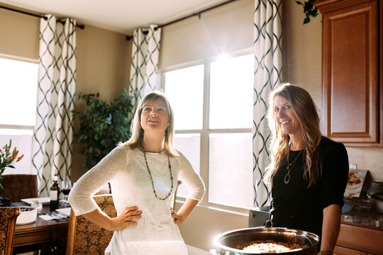 Women Socializing at Winter Party