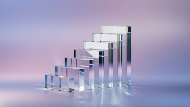 A set of clear glass rectangular prisms arranged in an ascending stair step formation with arranged stepped sequence varying heights arranged blocks