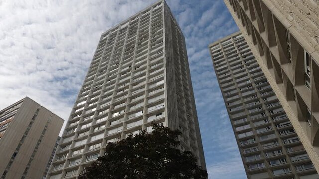 Brutalist architecture of residential skyscrapers dominates the urban landscape of Olympiades, Paris