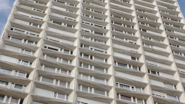 Olympiades building in Paris, France showing a repetitive facade with multiple apartment windows