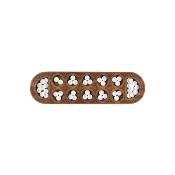 Wooden mancala board game with twelve circular pits and white playing stones for strategy play isolated on a transparent background