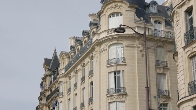 Paris Haussmann style building showcasing classic architecture details and balconies