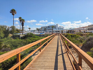 sand dunes that give access to La Barrosa beach in Sancti Petri, Cadiz, Spain © josevgluis