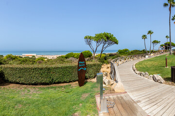 sand dunes that give access to La Barrosa beach in Sancti Petri, Cadiz, Spain © josevgluis