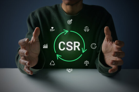 Hands Cupping Floating CSR Hologram with Circular Icons on Dark Background