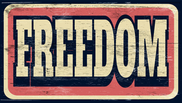 Retro aged freedom sign on wood