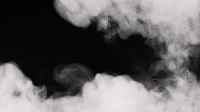 White smoke clouds swirl around the frame on a solid black background.